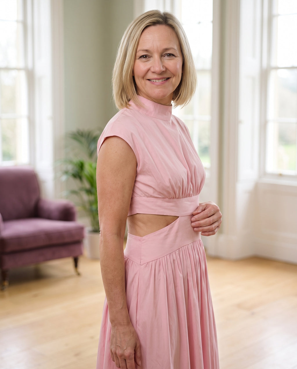 Woman wearing the effortless style for every occasion dress, close-up of the neckline and fabric