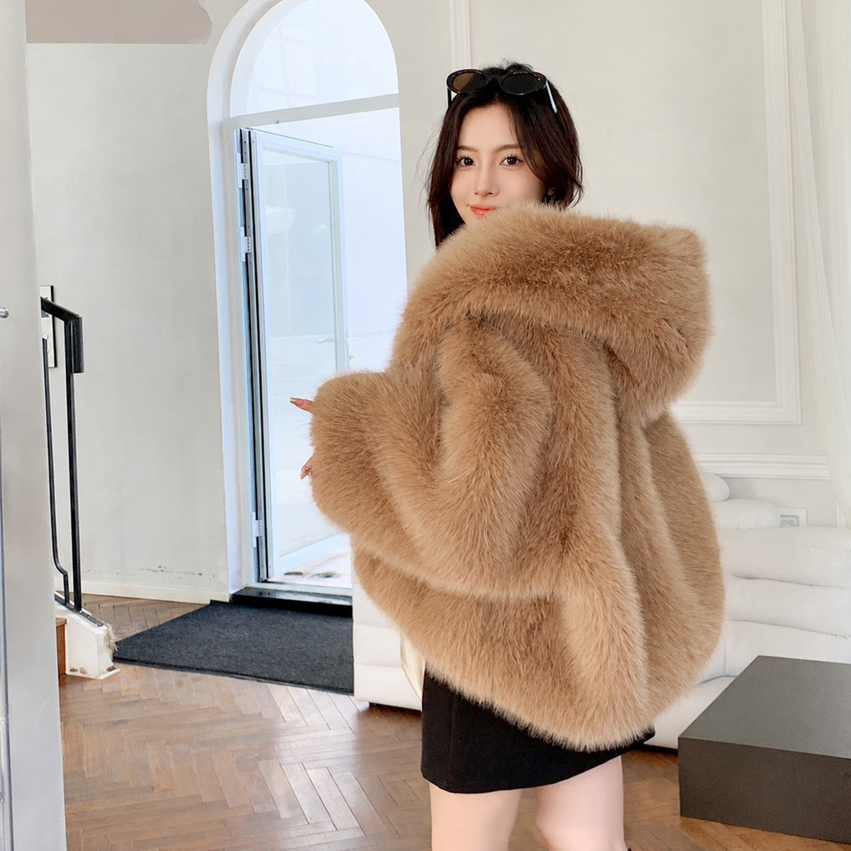 Women's oversized faux fur coat with big hood, brown, worn