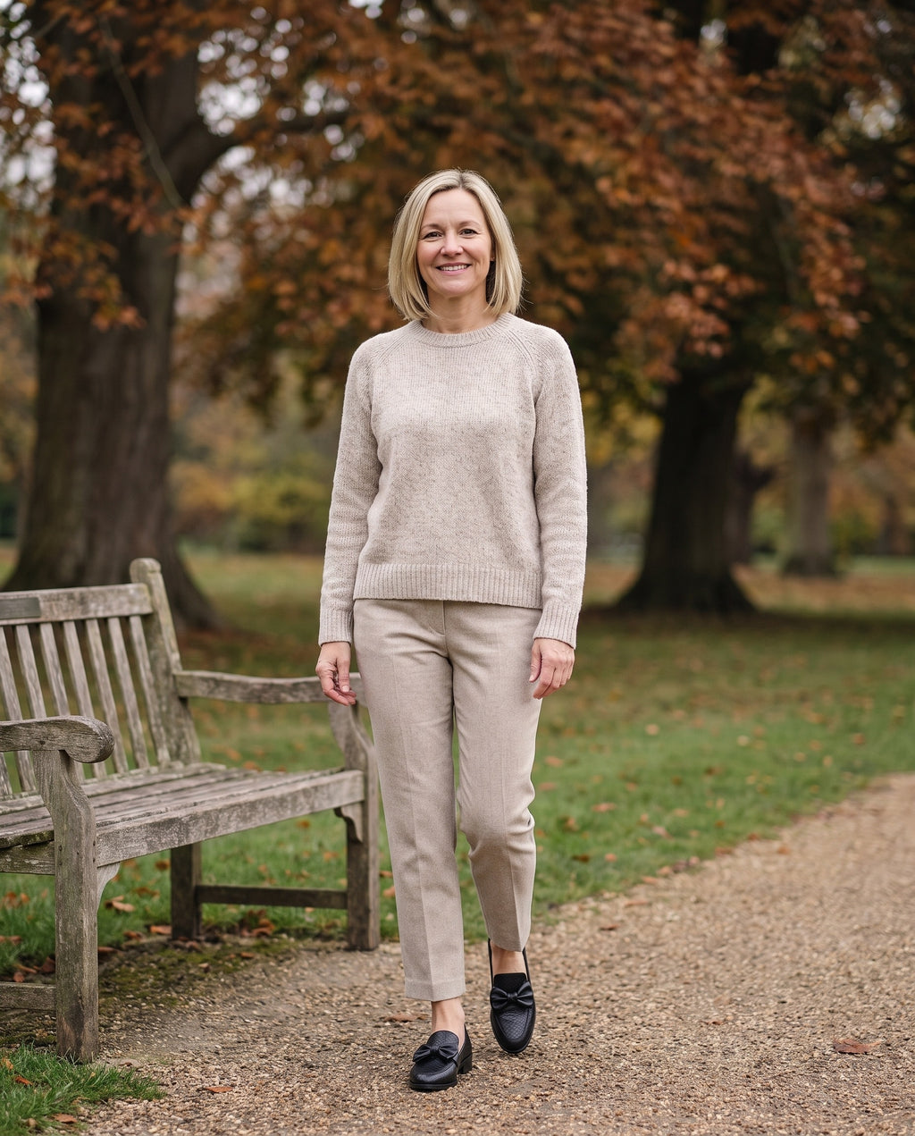 Woman wearing the luxe comfort loafers in an English park in autumn